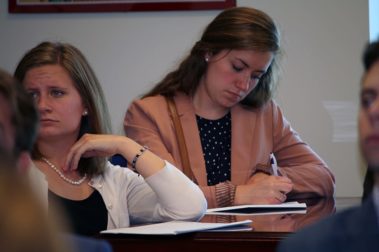 Students taking notes in class